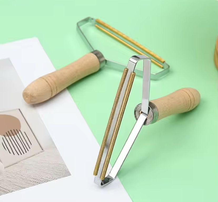 Pet hair scraper
